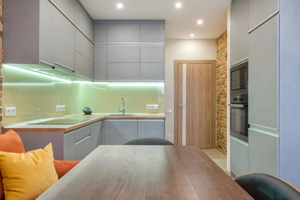 Custom kitchen cabinet layout with high-end finish in Lahore